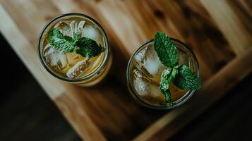 Refreshing green mint lemonade served with ice in summer afternoon photo