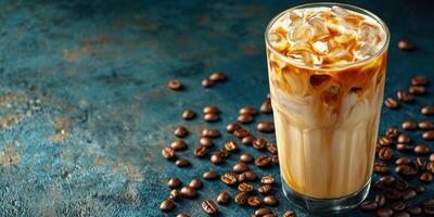 Iced coffee with cream served in a glass with coffee beans photo