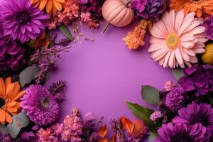 Autumn flowers and pumpkins in vibrant colors with blank space photo