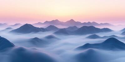 Evening fog envelops mountains at dusk in a serene landscape photo
