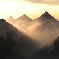 Foggy mountains at dusk with a soft golden light photo