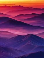 Foggy mountains at dusk with vibrant colors in the evening sky photo