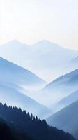 Evening fog envelops mountains creating a serene landscape photo