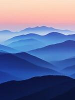 Evening fog envelops mountains creating a serene twilight landscape photo