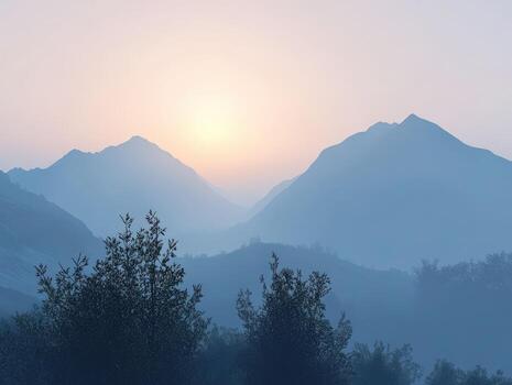 Evening fog envelops mountains as the sun sets behind peaks photo