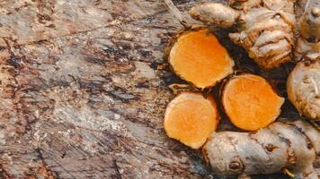 Turmeric or Curcuma longa Linn or rhizome root, a tuber plant that has a distinctive color and aroma photo
