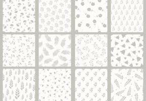 Collection of beige neutral seamless floral patterns - drawing design. Repeatable spring nature delicate backgrounds with branches and flowers. Textile endless prints vector