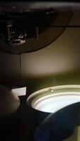 Old slide projector light path. Unit the light inside close up video