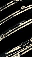Abstract futuristic space ship with its rotating parts made of metal on black background, seamless loop. Animation. Silver mechanism with spinning round details. video