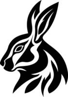 Stylized black and white tribal rabbit head design, perfect for tattoo art, branding, and other graphic design projects vector