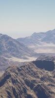 An aerial view of a mountain range in the desert video