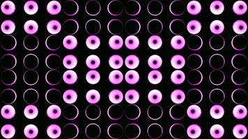 Set of LEDS lighting on a dark background. Design. Abstract wall of flashing slowly light bulbs of round shape, concert stage illumination. video