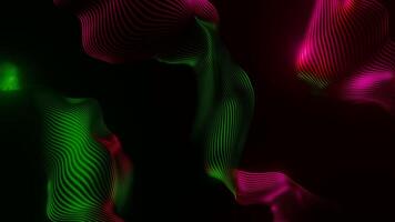 Abstract colorful fabric fluttering in the wind on a black background. Design. Thin piece of cloth swaying in the wind. video