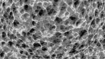 Gray and yellow background. Motion.Light molecules of different colors made in computer graphics are pushed apart in different directions. video