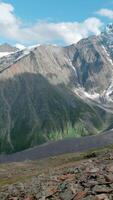 View from the hill top of endless snow capped mountain range. Clip. Amazing white snow covered mountain peaks. video