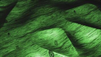 Green swaying canvas in 3d. Motion.A light floor that moves apart in a cartoon animation with small dark patterns. video