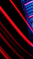 Animation of glowing neon lines. Abstract background with wavy color lines. Concept of computer graphics video