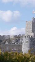 Ancient stone fortress with towers. Action. Fabulous view of stone fortress with towers in medieval style. Beautiful stone fortress with strange medieval architecture in summer video
