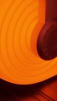 Unwinding orange ribbon. Design. Light animation with a bright ribbon that unwinds in abstraction. video