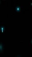 Abstract flying blue sparks on a black background. Design. Up and down moving tiny particles. video