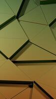Abstract triangular geometric tiles. Design. Mosaic pattern with green and yellow gradient tiles. video