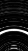 Abstract black and white circle beating on black background. Monochrome shimering curved lines moving slowly. video