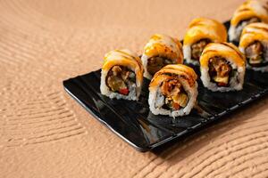 sushi is a Japanese dish of prepared vinegared rice, usually with some sugar and salt, accompanied by a variety of ingredients such as seafood, often raw and vegetables. photo