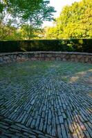 Radial pattern of natural stones, photo in the park in Nantes