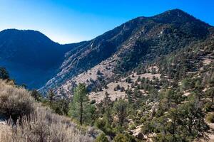 Beautiful mountain scenery on the background of clouds, layers of mountains on the horizon, Sierra Nevada Mountains, California, USA photo