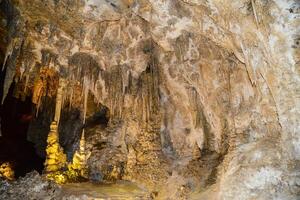 Calcite inlets, stalactites and stalagmites in large underground halls in Carlsbad Caverns National Park, New Mexico. USA photo