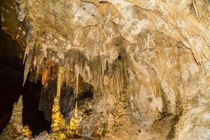Calcite inlets, stalactites and stalagmites in large underground halls in Carlsbad Caverns National Park, New Mexico. USA photo