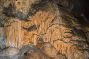 Calcite inlets, stalactites and stalagmites in large underground halls in Carlsbad Caverns National Park, New Mexico. USA photo