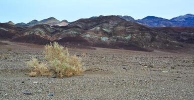 Erosion Hills of colorful clay eroded by rain, California photo