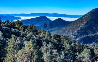 Beautiful mountain scenery on the background of clouds, layers of mountains on the horizon, Sierra Nevada Mountains, California, USA photo