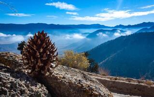 Beautiful mountain scenery on the background of clouds, layers of mountains on the horizon, Sierra Nevada Mountains, California, USA photo