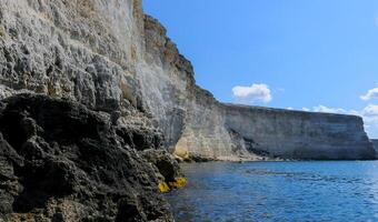 High Coastal cliffs from layered Pontic limestone in the western Crimea, Tarkhankut photo