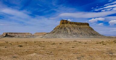 Factory Butte is a summit in Wayne County, Utah, US photo