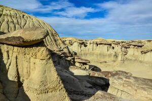 Weird sandstone formations created by erosion at Ah-Shi-Sle-Pah Wilderness Study Area in San Juan County near the city of Farmington, New Mexico. photo