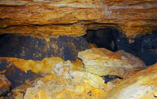 Collapse of the roof and walls in the old Odessa catacombs, sawn out in the Pontian shell rock in Odessa photo