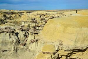 Weird sandstone formations created by erosion at Ah-Shi-Sle-Pah Wilderness Study Area in San Juan County near the city of Farmington, New Mexico. photo