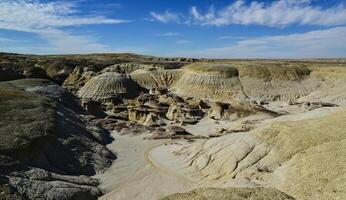 Weird sandstone formations created by erosion at Ah-Shi-Sle-Pah Wilderness Study Area in San Juan County near the city of Farmington, New Mexico. photo