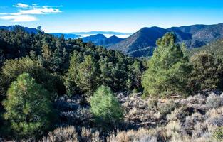 Beautiful mountain scenery on the background of clouds, layers of mountains on the horizon, Sierra Nevada Mountains, California, USA photo