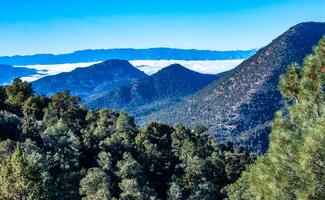 Beautiful mountain scenery on the background of clouds, layers of mountains on the horizon, Sierra Nevada Mountains, California, USA photo