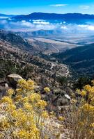 Beautiful mountain scenery on the background of clouds, layers of mountains on the horizon, Sierra Nevada Mountains, California, USA photo