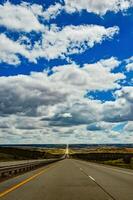 Rain clouds during the day over the plains in Utah, US photo