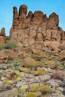 Mountain erosion formations of red mountain sandstones, Desert landscape with cacti, Arizona photo