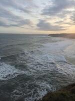 Big waves in the evening when the high tide photo