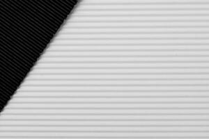 Abstract corrugated paper background. Rough decorative paper texture. photo