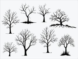 A set of silhouettes of bare trees vector