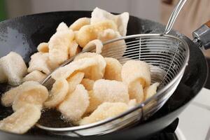 Process Deep Frying Crackers in the Hot Oil photo